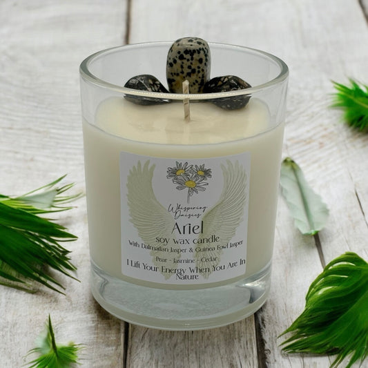 Ariel Angel Candle in a clear glass jar, topped with dalmatian jasper and guinea fowl jasper crystals, handmade soy candle from Whispering Daisies in North Devon.