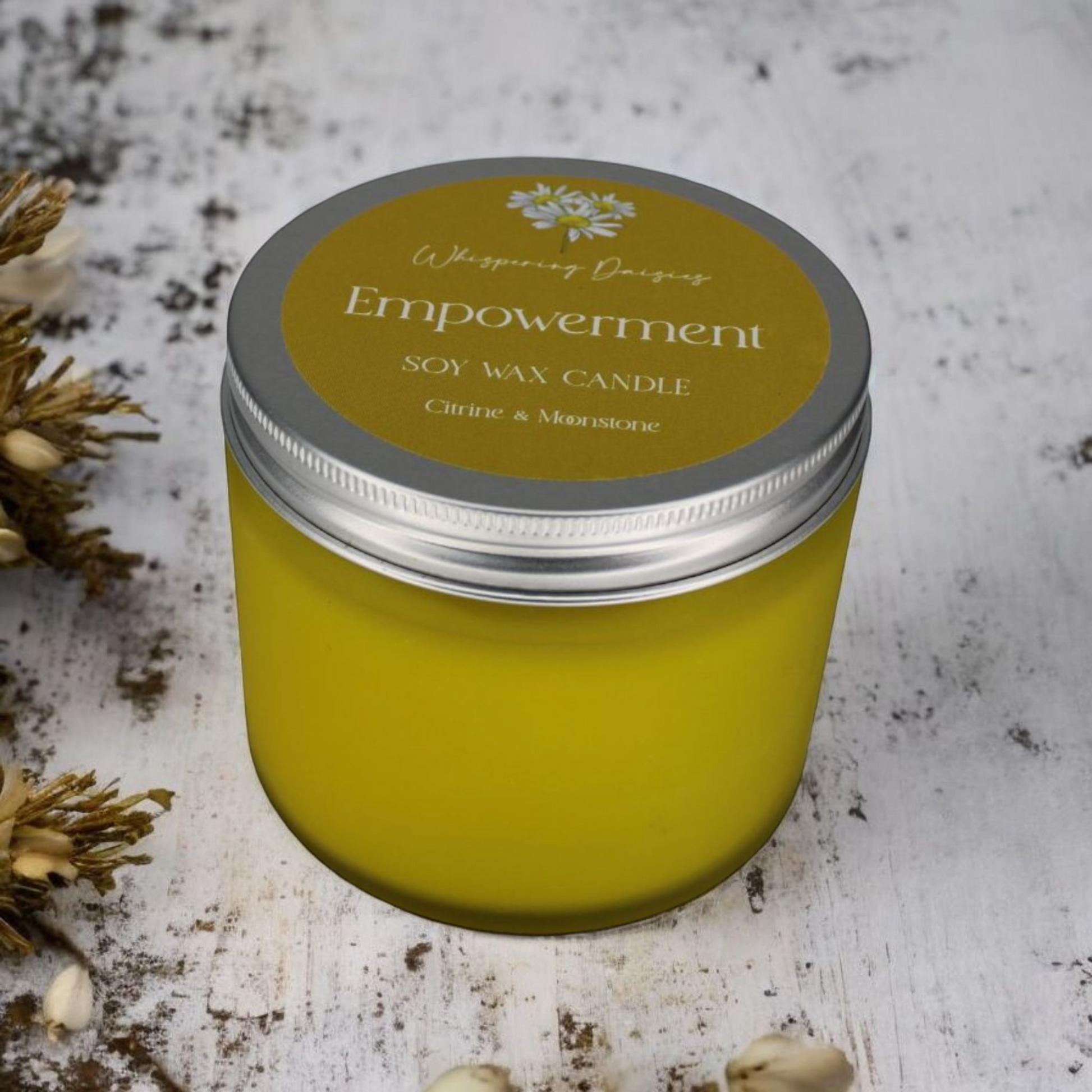 Empowerment Candle featuring citrine and moonstone crystals, citrus and floral fragrance, artisan-made in North Devon.