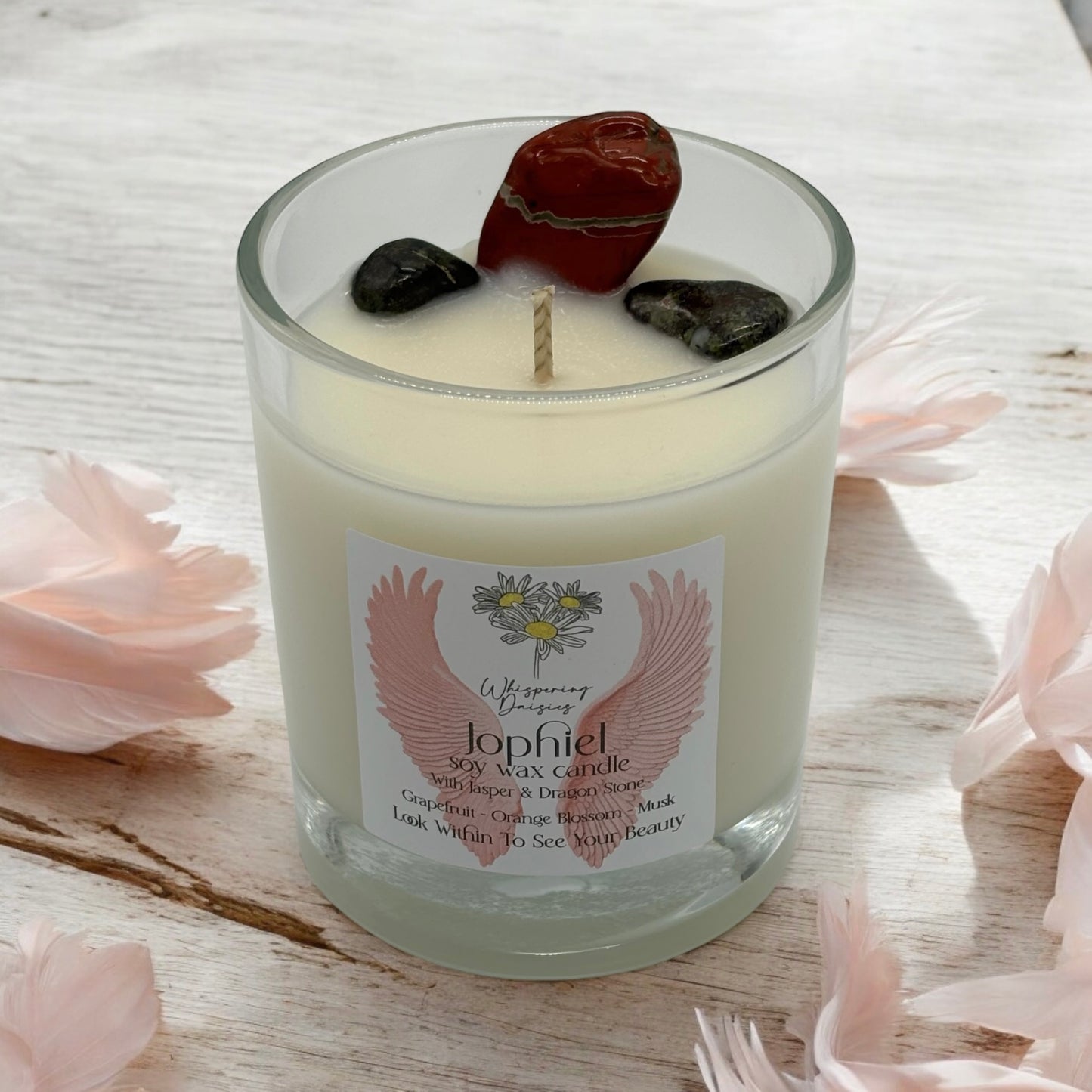 Jophiel Angel Candle in a clear glass jar, topped with jasper and dragon stone crystals, handmade soy candle from Whispering Daisies in North Devon.