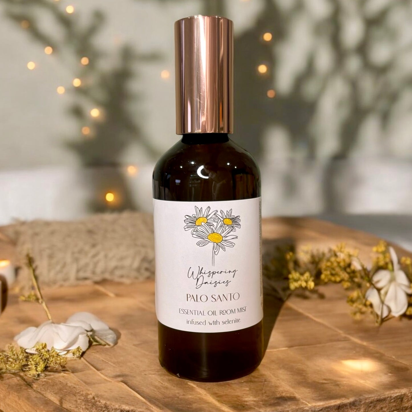 Palo Santo & Selenite Room Mist in a 100ml glass bottle, handmade spiritual cleansing spray by Whispering Daisies, perfect for meditation or bedtime.