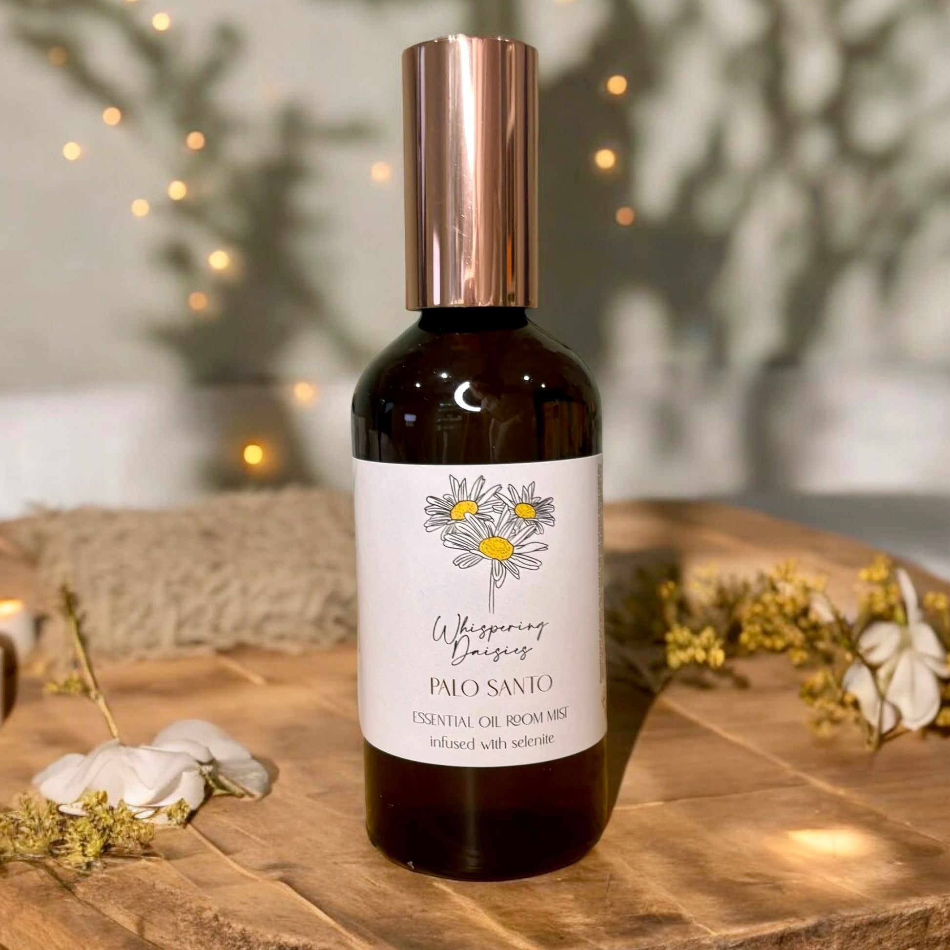 Palo Santo & Selenite Room Mist in a 100ml glass bottle, handmade spiritual cleansing spray by Whispering Daisies, perfect for meditation or bedtime.