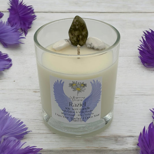 Raziel Angel Candle in a clear glass jar, topped with epidote and white howlite crystals, handmade soy candle from Whispering Daisies in North Devon.