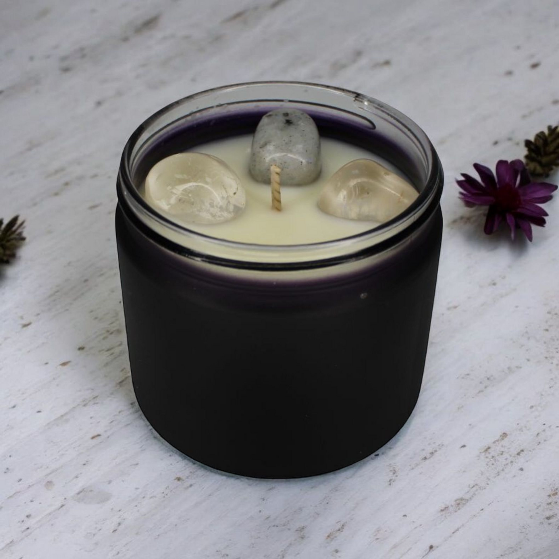 Wisdom Candle with clear quartz and grey labradorite crystals, fruity floral aroma, handmade by Whispering Daisies.